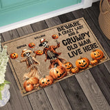 Personalized Beware A Crazy Lady And A Grumpy Old Man Live Here Skeleton Couple Doormat NTMTHN23614